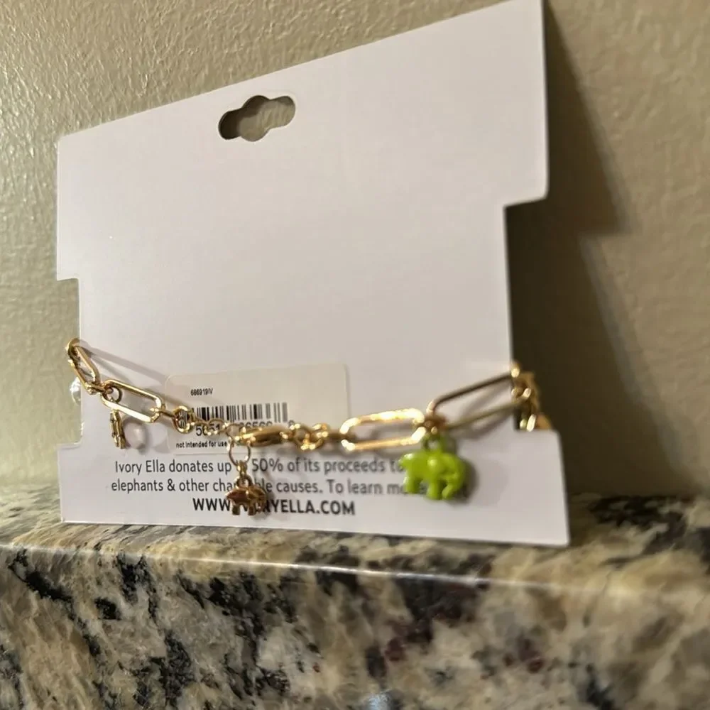 NWT ivory ella gold tone paper clip style charm bracelet